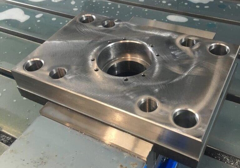 This is a machined cylinder mounting plate that we fabricated. 